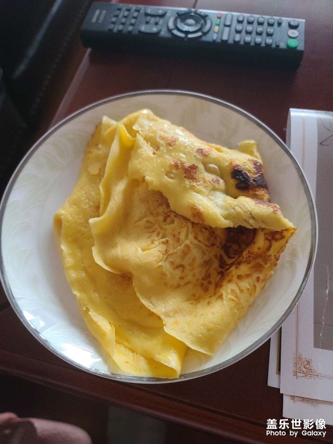 第一次嘗試?yán)与u蛋餅